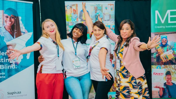 Team photographed at an exhibition stand