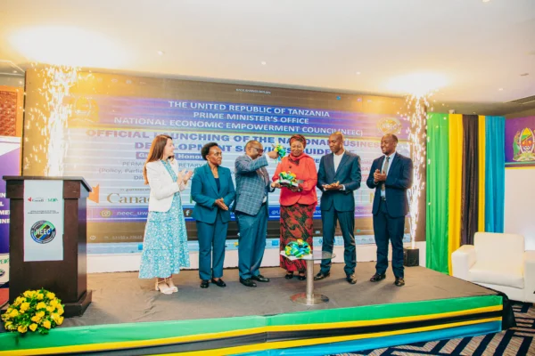 Officials on stage at a national programme launch